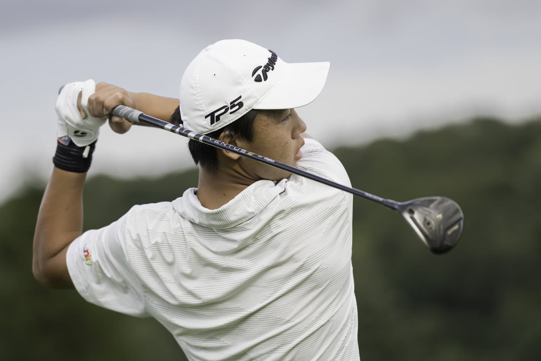 At age 14, St. Davids golfer Kaige Zhu is six feet tall and regularly drives the ball 275 yards. 