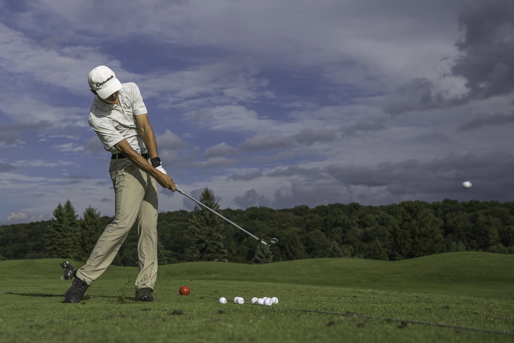 Kaige Zhu works on his iron play at Royal Niagara Golf Club. 
