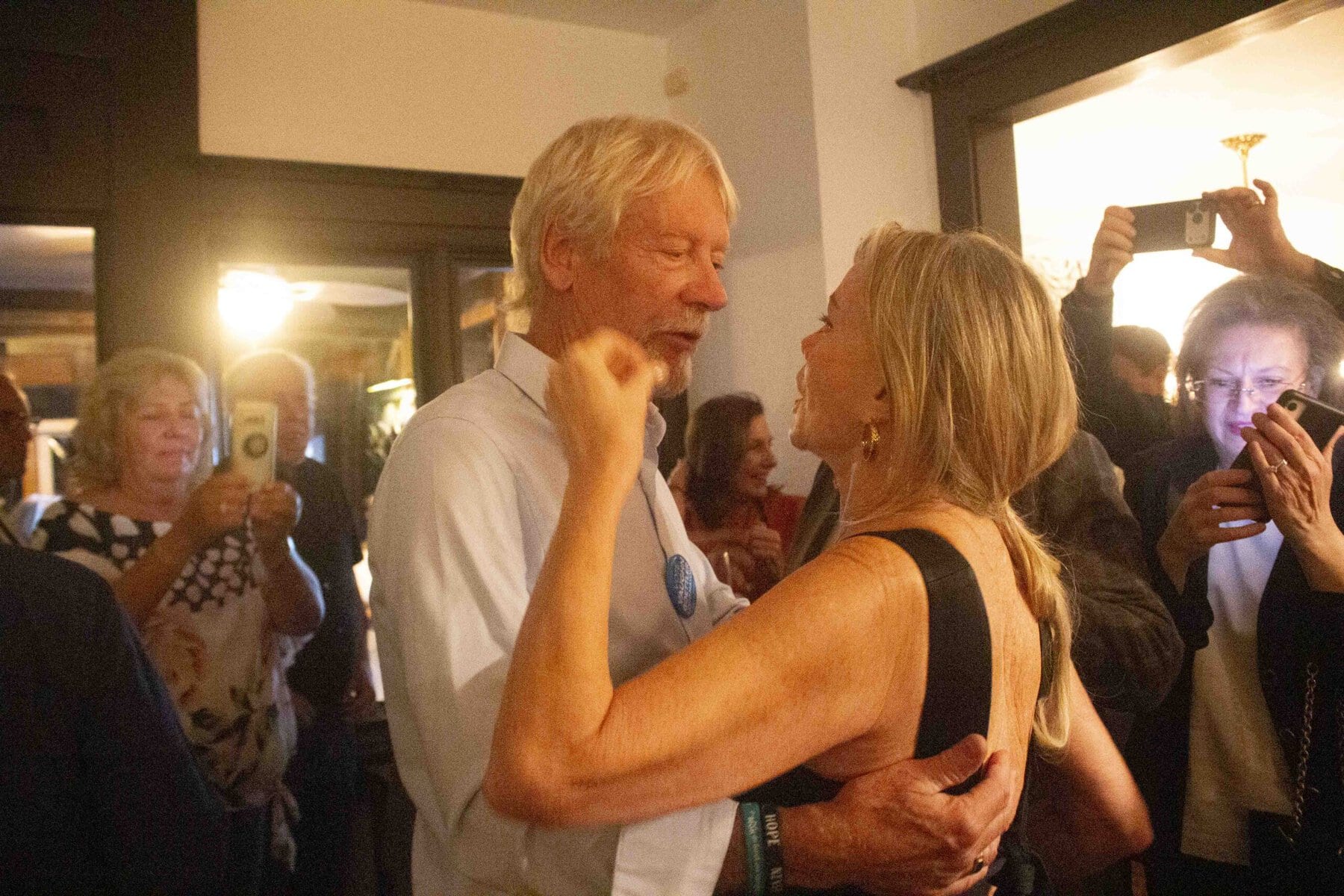 Vaughn Goettler embraces his wife Lauren after winning the election with 55.1 per cent of the vote.