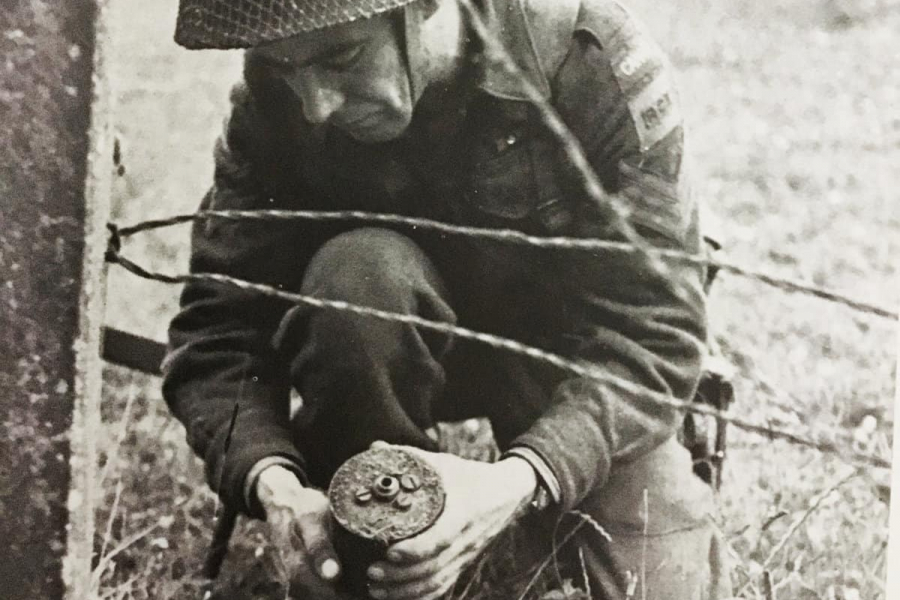 A Canadian soldier tackles the dangerous task of disarming a land mine.