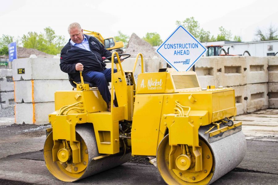 Doug_Ford_drives_a_steamroller_at_McNab_Acres_before_a_press_conference_about_the_Garden_City_Skyway_and_provincial_election._Evan_Saunders_2
