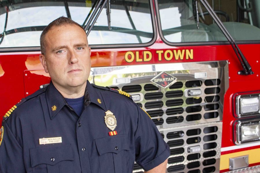 Fire_Chief_Nick_Ruller_in_front_of_the_Old_Town_tanker_in_Fire_Station_1._Evan_Saunders