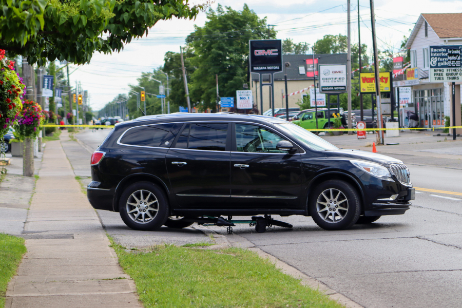 A Buick SUV struck  a  young cyclist as the  vehicle was leaving Phil's Independent Grocer on  Tuesday afternoon.