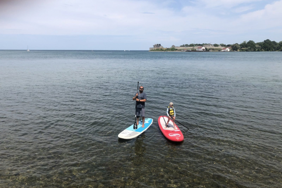 Paddleboard instructor Tim Balasiuk with his plus one enjoying a lesson on the Niagara River.