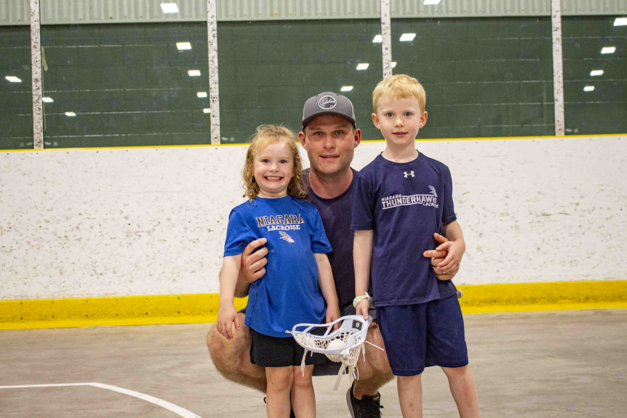 Jared Hope with his son Bennett and daughter Tracy. The two youngsters are already following in dad's footsteps as lacrosse players.