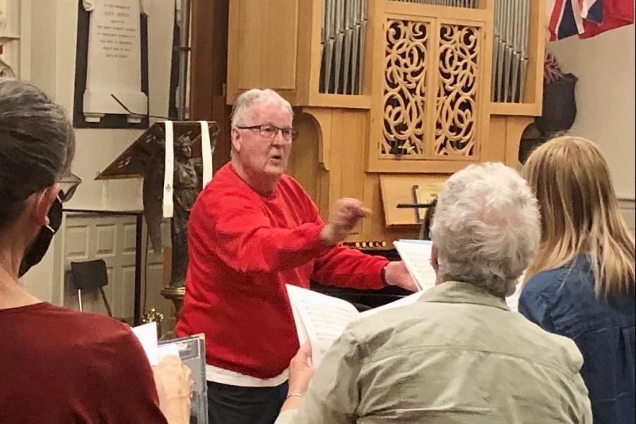 Michael_Tansley,_founder_and_music_director_of_the_Newark_Singers,_leads_a_rehearsal_of_the_26-voice_choir,_in_preparation_for_the_June_4_concert_at_St._Marks_Church.1