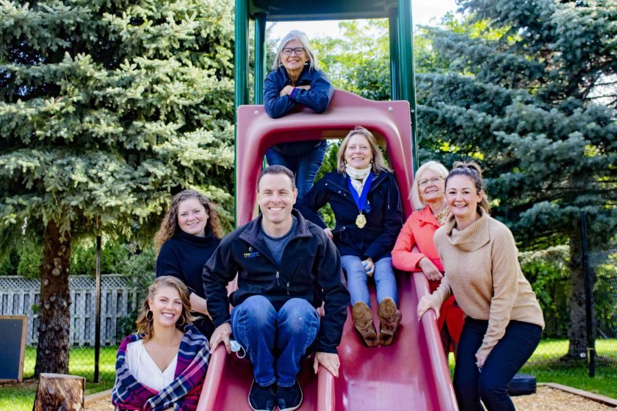 Nursery_staff_and_Rotary_Club_members_hang_out_in_the_playground_while_touring_the_school._Evan_Saunders_2