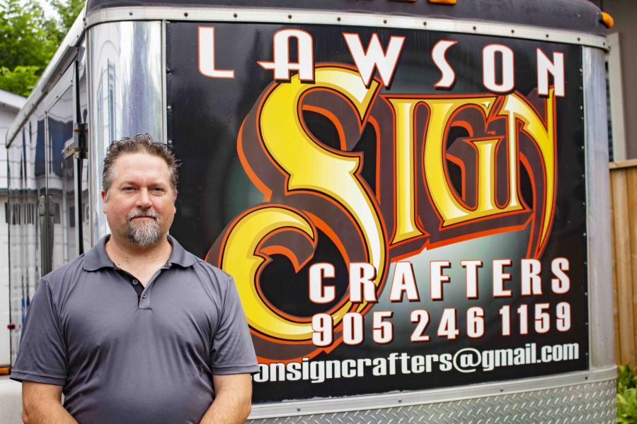 Taylor Lawson owns the only sign making company in Niagara-on-the-Lake. He is frustrated the Town of Niagara-on-the-Lake used an out of town sign maker to print it's ads encouraging people to shop in NOTL.